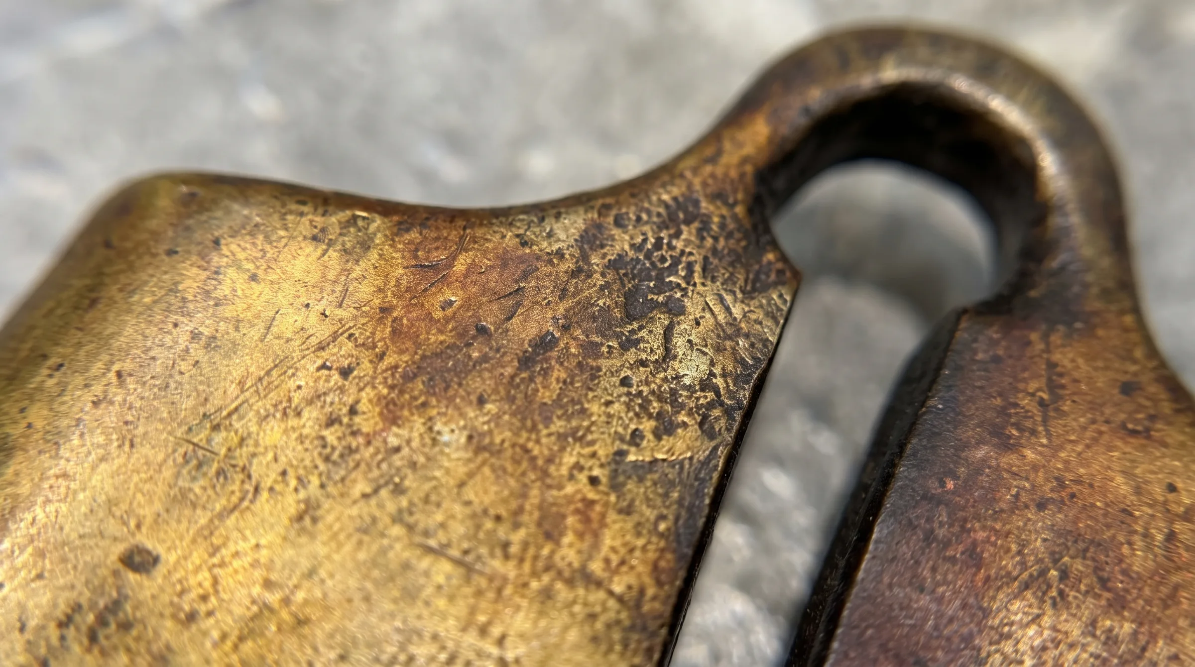 Close-up of the bronze patina on the Ogene MIDI: 004 casting